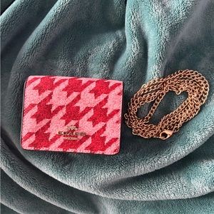 Mini wallet on a chain with houndstooth print